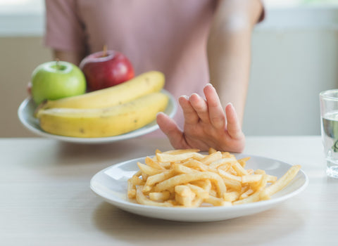 Woman refuse junk food or fast food