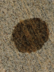 how to remove oil stains on granite