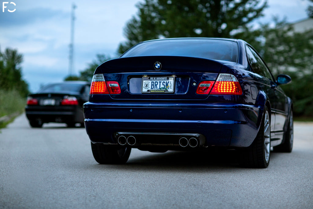 Michael Pierga E46 M3 Interlagos Blue rear angle shot with Eisenmann Race exhaust and CSL diffuser and trunk