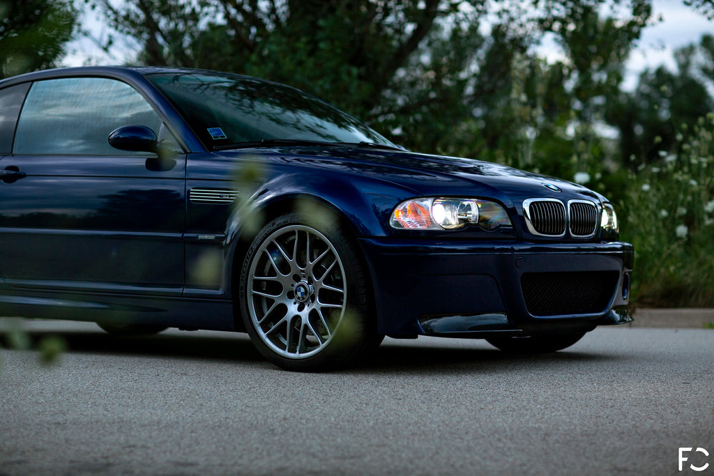 Michael Pierga E46 M3 Interlagos Blue front 3/4 angle shot with Future Classic club sticker and CSL front bumper