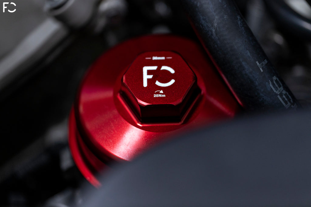 Front view of the Future Classic E9X (S65) Red Oil Filter Cap installed in engine bay