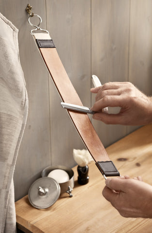 Using a leather strop to sharpen and hone your razor