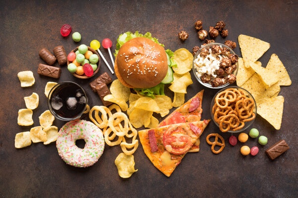 9 faqs about inflammation close up of a pile of junk food that could cause inflammation