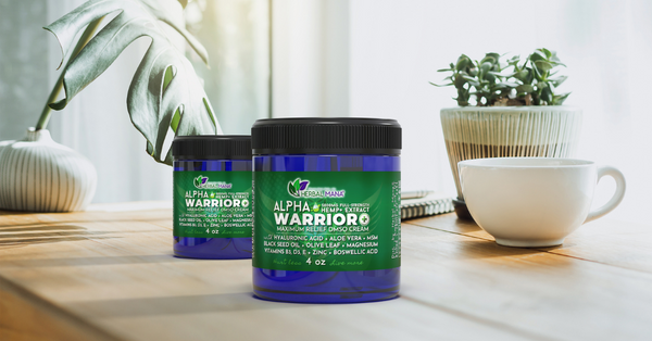alpha-warrior-maximum-relief-DMSO-cream-sitting-on-a-kitchen-table-with-cup-of-tea-in-background