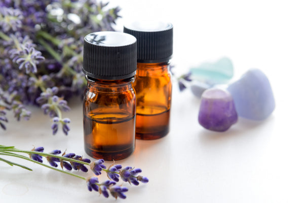 essential oils for cleansing charging crystals lavender oil for cleansing crystals close up with fresh lavender