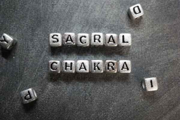 sacral chakra healing crystals affirmations and more sacral chakra spelled out in silver beads