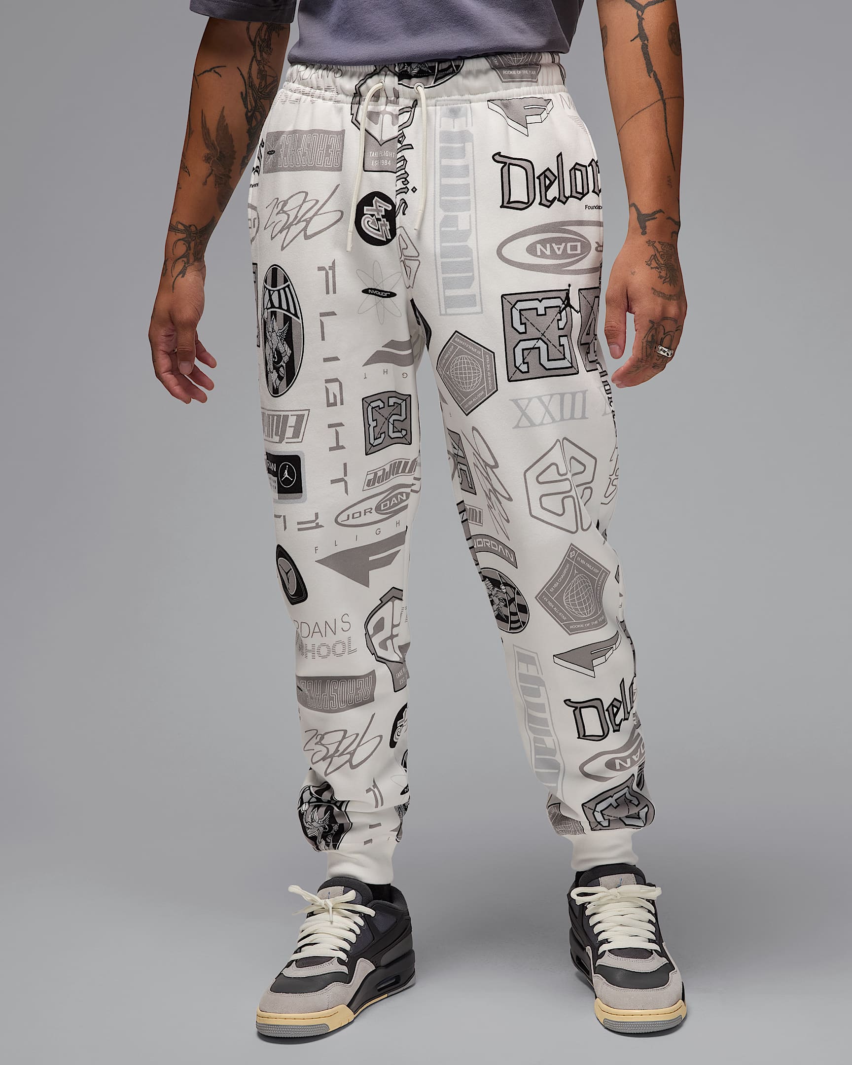 M J ESS AOP FLC PANT 5 c16b4e49 6e3a 4b99 b9ec e36e8a496ed2