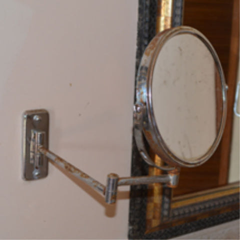 Rusting Magnifying Mirror