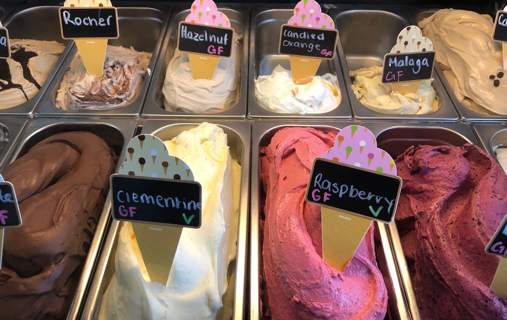 display case with gelato in various flavours
