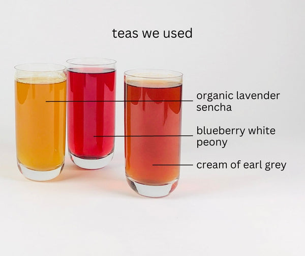 glasses of steeped organic lavender sencha, blueberry white peony and cream of eary grey teas