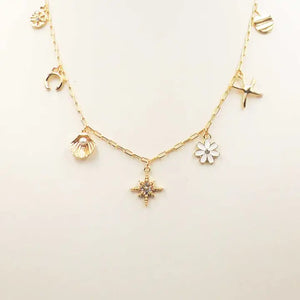 GOLD STARBURST FLOWER AND HEART NECKLACE 16" - 18" - Simply Carolina