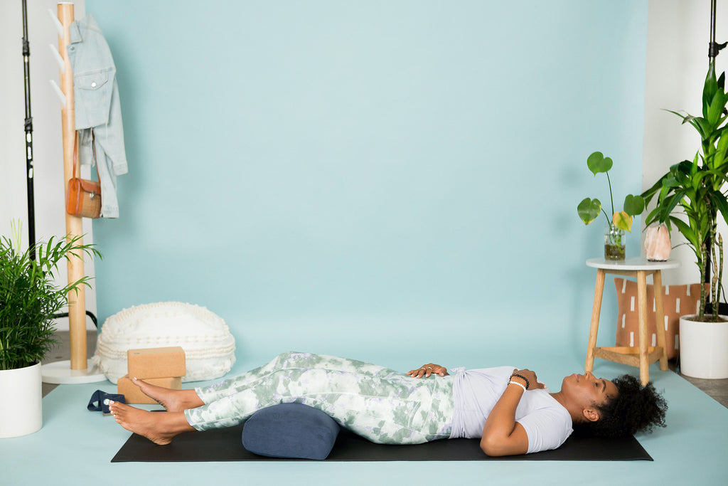 yogi laying with bolster