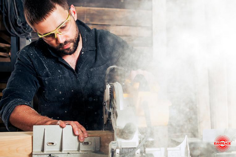 Man woodworking with electric drill