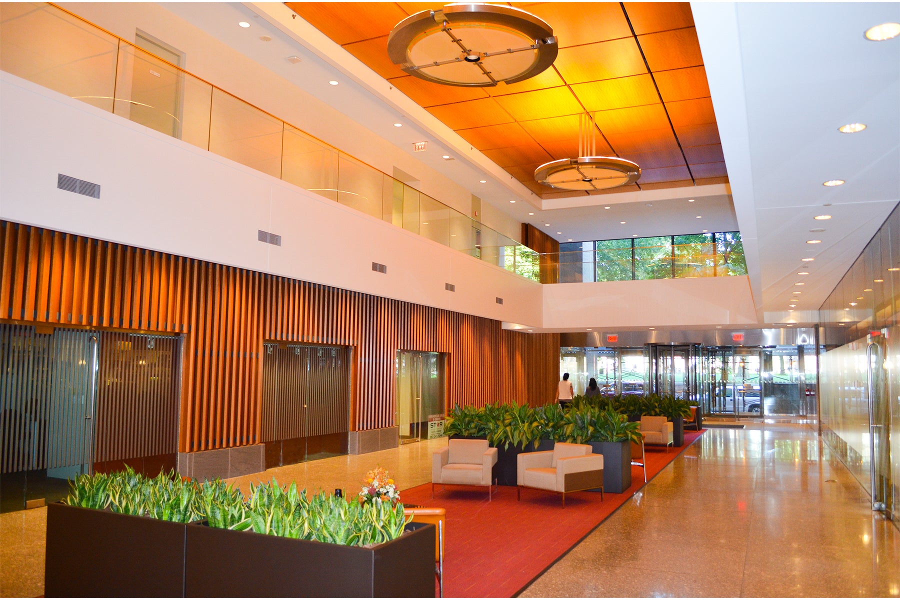 Modern Elite indoor planters in foyer. Designed by Feigus Office Furniture.