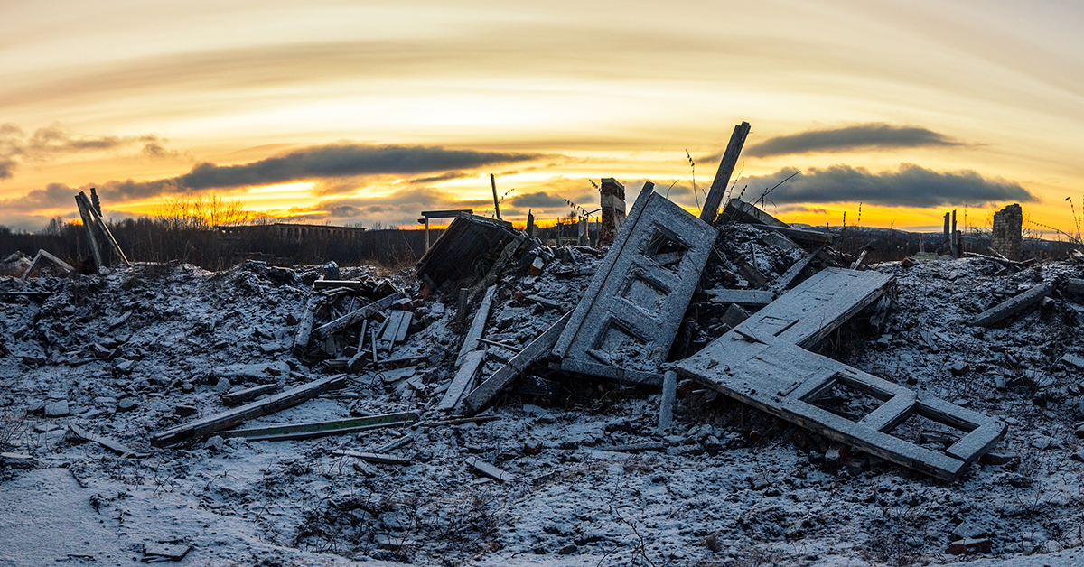 picture of a ruined house with ashes all over