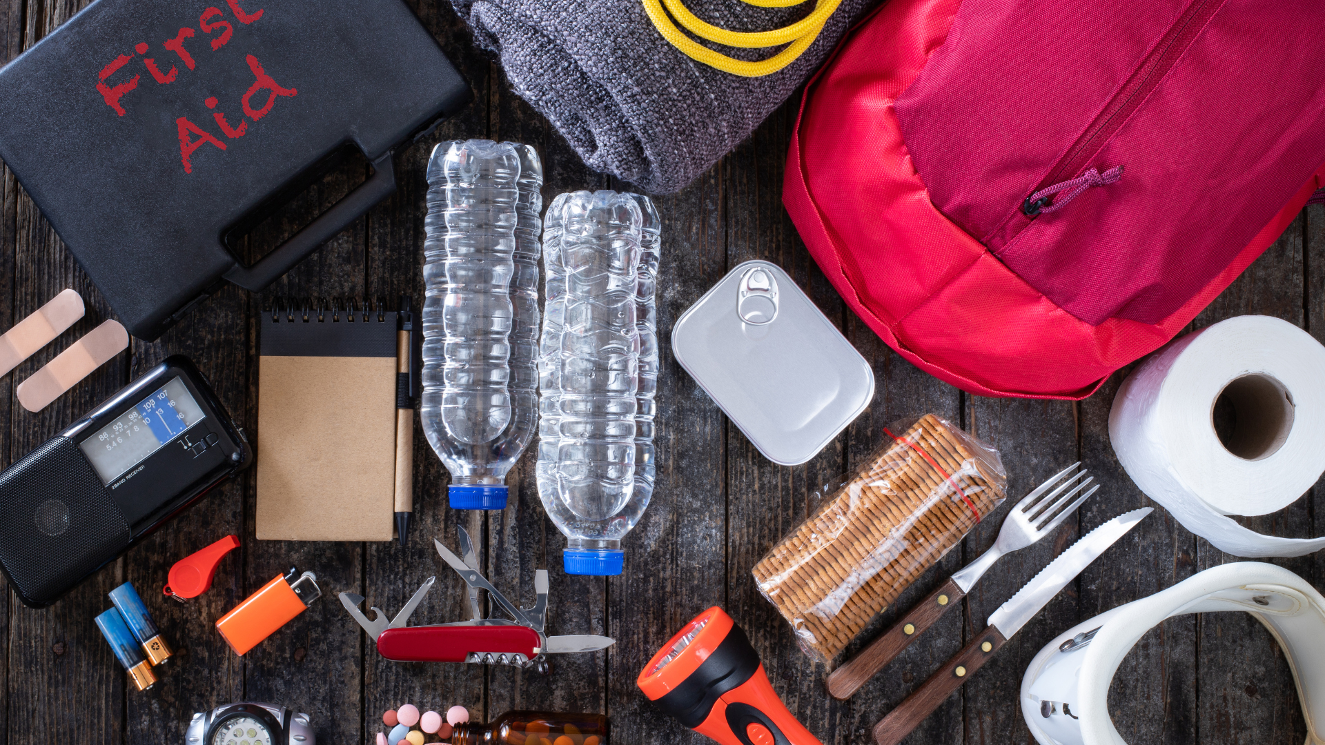 emergency supplies and bug out bag on the table