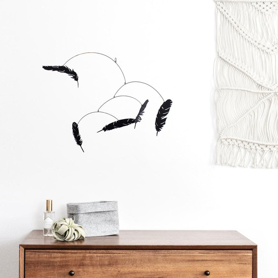 https://www.ottigoods.com/collections/lasercutmobiles/products/falling-feather-mobile