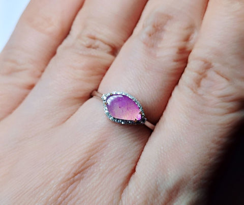 A picture of a sugilite ring