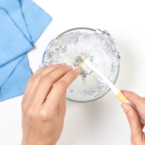 How to clean stone jewelry with a soft bristled toothbrush