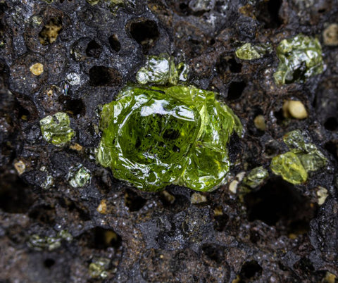 Sometimes peridot forms on volcanic rock