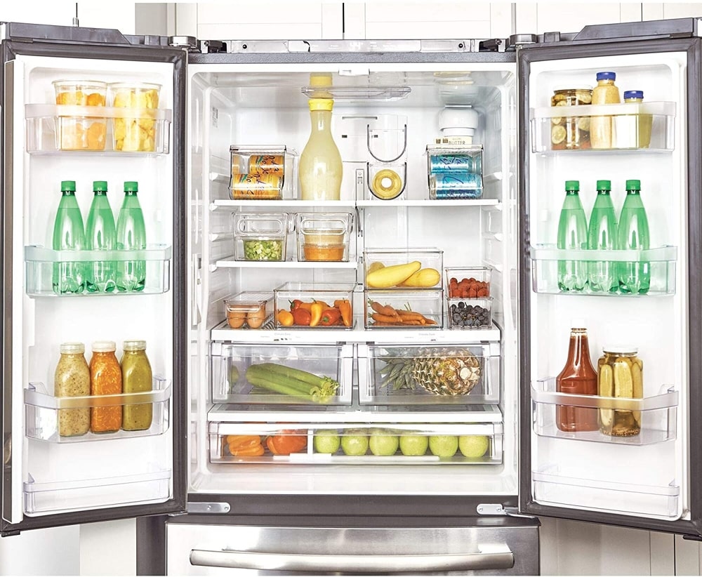 storing similar items together in the fridge is a simple way to stay organised. clear fridge containers are a great way to do this.