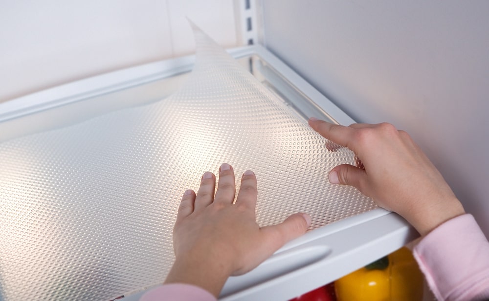 use a god quality fridge shelf liner to keep your fridge clean and organised