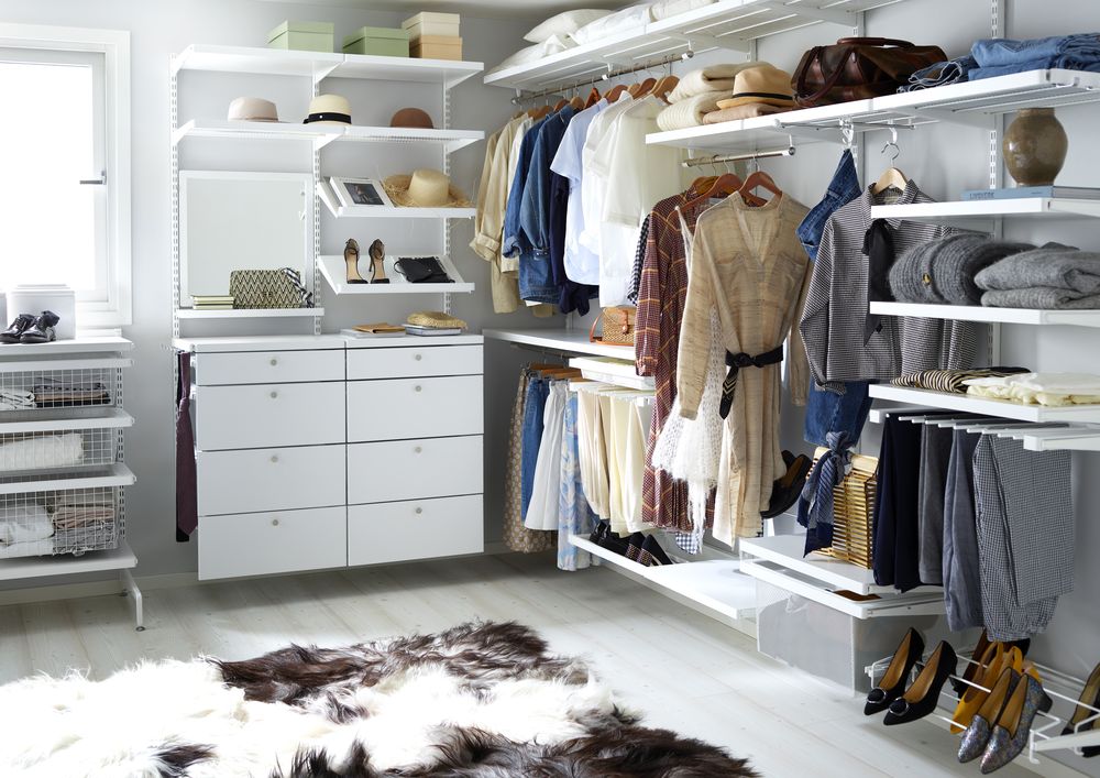 Elfa wardrobe system with white decor accessories