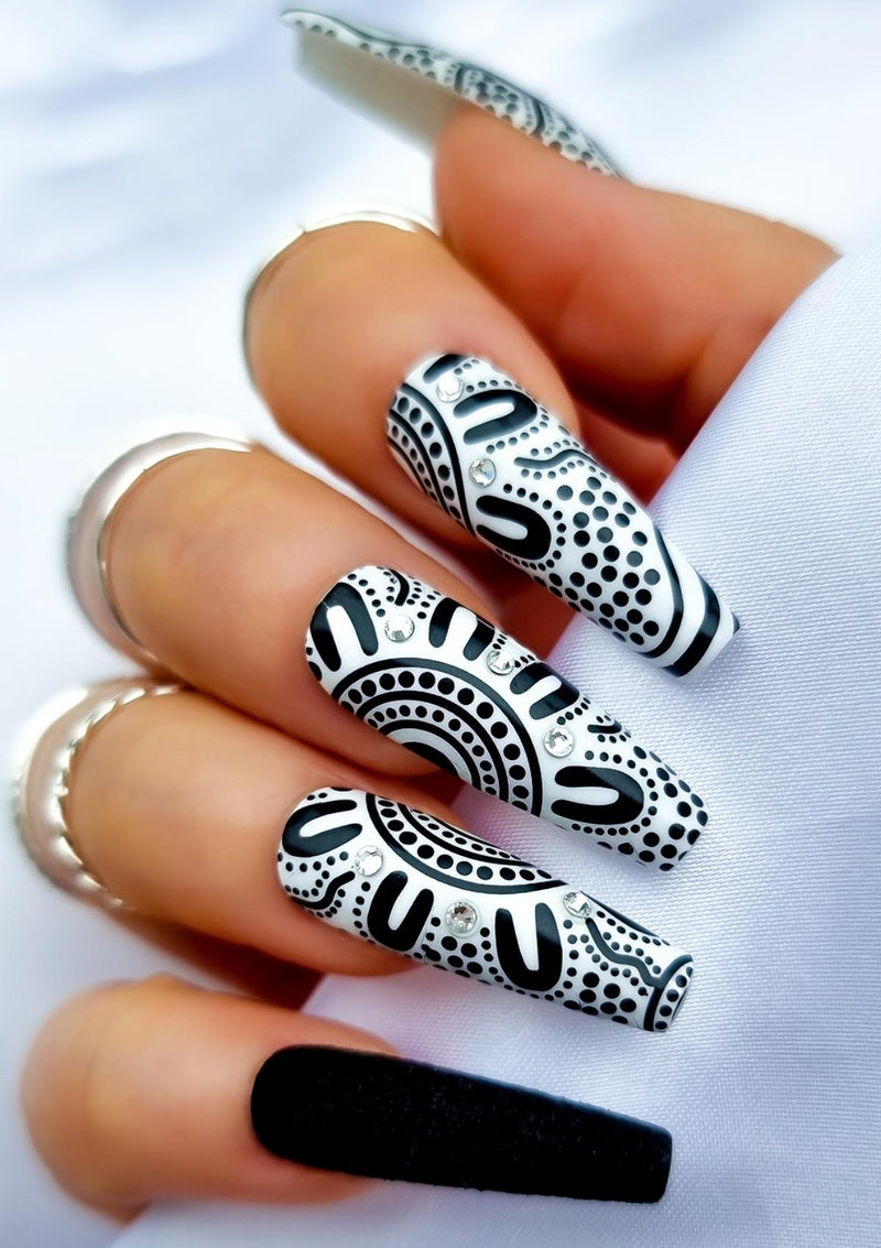 black and white tribal print nails