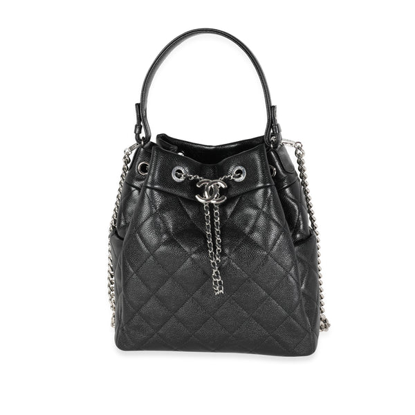 chanel quilted drawstring bag