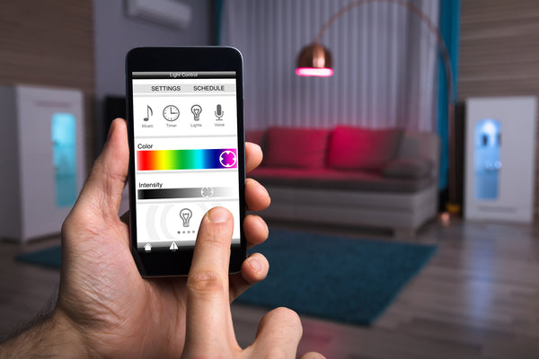 Smartphone showcasing software controls for adjusting LED lighting color of a floor lamp.