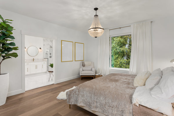 An Empire Chandelier showcased in a bedroom as a statement piece.