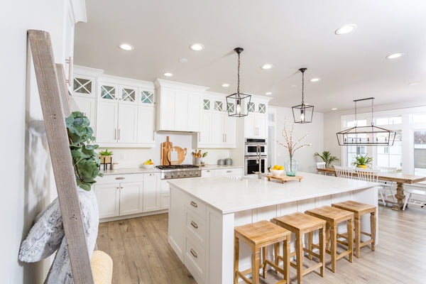 A series of Recessed Lighting illuminating a modern kitchen.