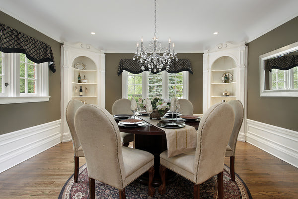 Crystal Chandelier Above a Round Dining Table