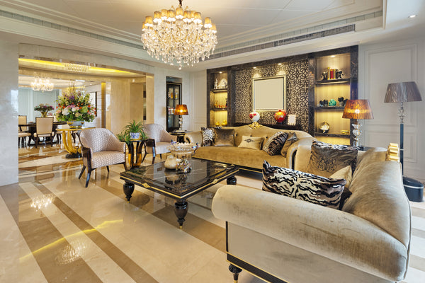 Living Room with Layered Lighting Fixtures incorporated within the Interior Design of a room.