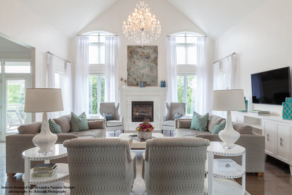 Traditional Crystal Chandelier showcased in a modern living room with a high ceiling.