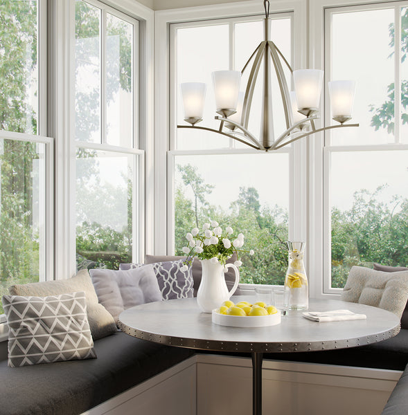 Transitional Style Chandelier showcased above a breakfast nook table.