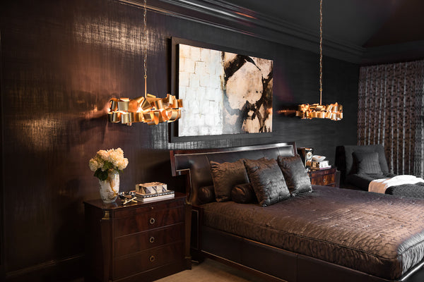 A pair of Contemporary Chandeliers showcased as bedside lighting in a Modern bedroom.