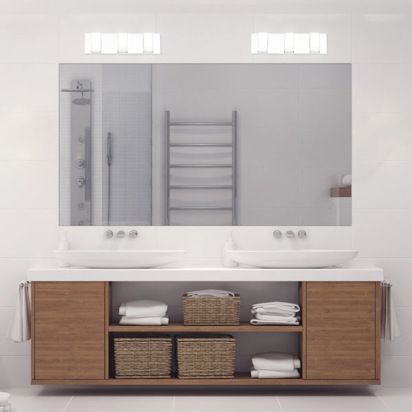 Dual vanity setup with linear bath vanity lights above the mirrors.