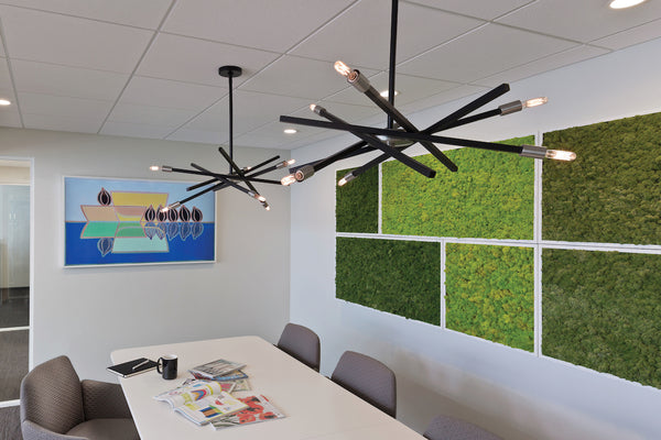 Modern Sputnik Style Chandelier showcased above an office meeting table.