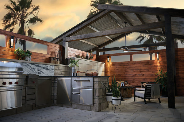 Outdoor patio showcasing Hinkley's Artiste Outdoor Ceiling Fan.