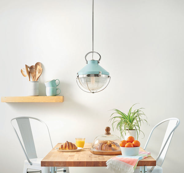 Vintage Pendant Light Above A Dining Table