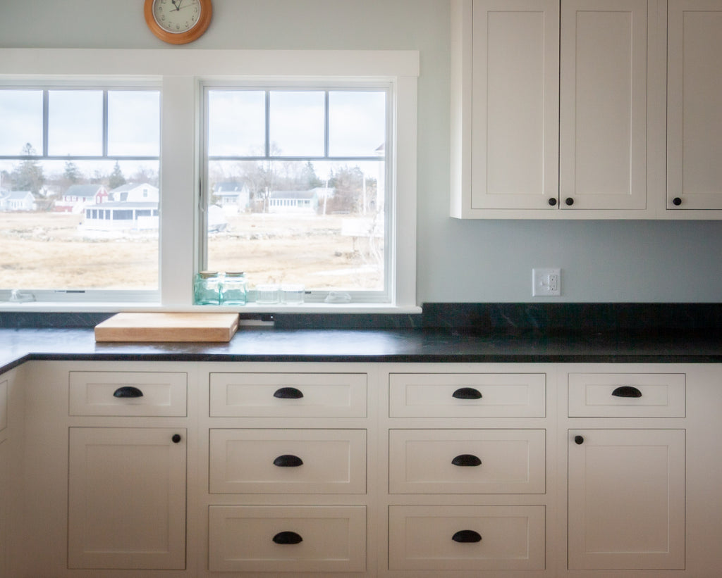 Inset cabinetry with knobs and pulls