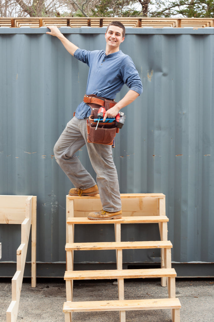 student climbing to the top of his stair i triumph