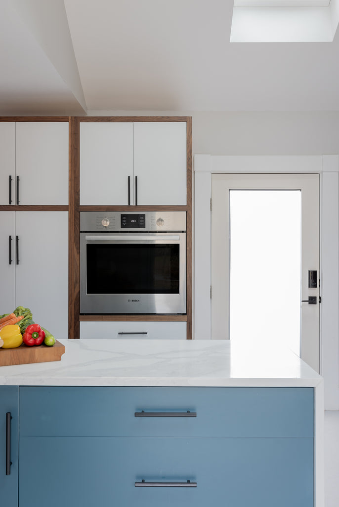 Two-Tone Walnut and White Wall Cabinetry w/Marine Island