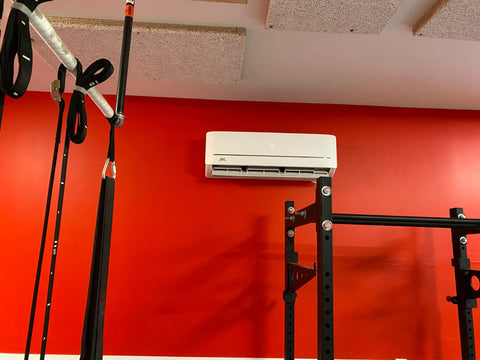 Wall mount on a red wall in a gym