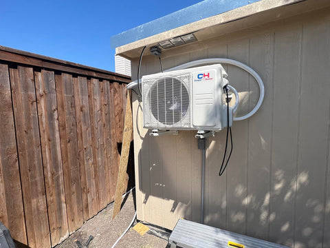 Single Condenser placed onto the center of a smaller property