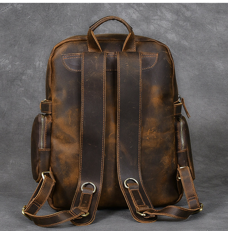 men's Brown distressed Leather book-bag with zipper pockets, gold-tone brass hardware aand metallic buckle