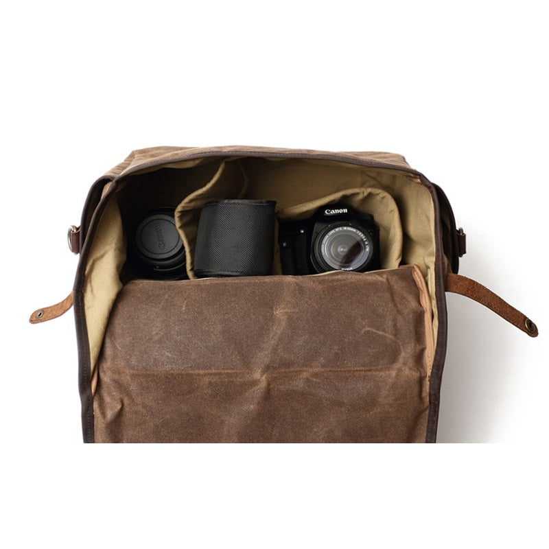 camera side bag with a divider for compact dslr or lens cases