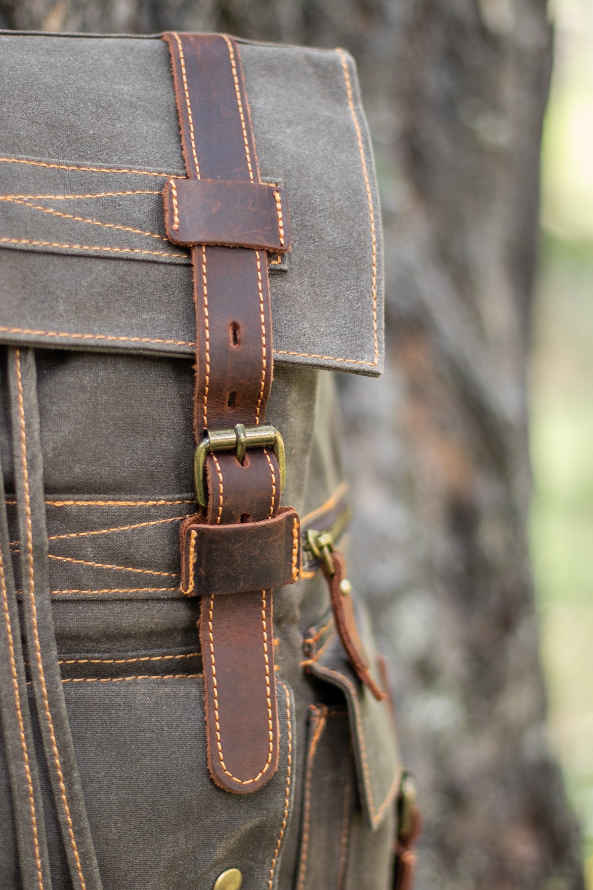 woven organic cotton canvas and leather bag with main drawstring pouch and side pocket