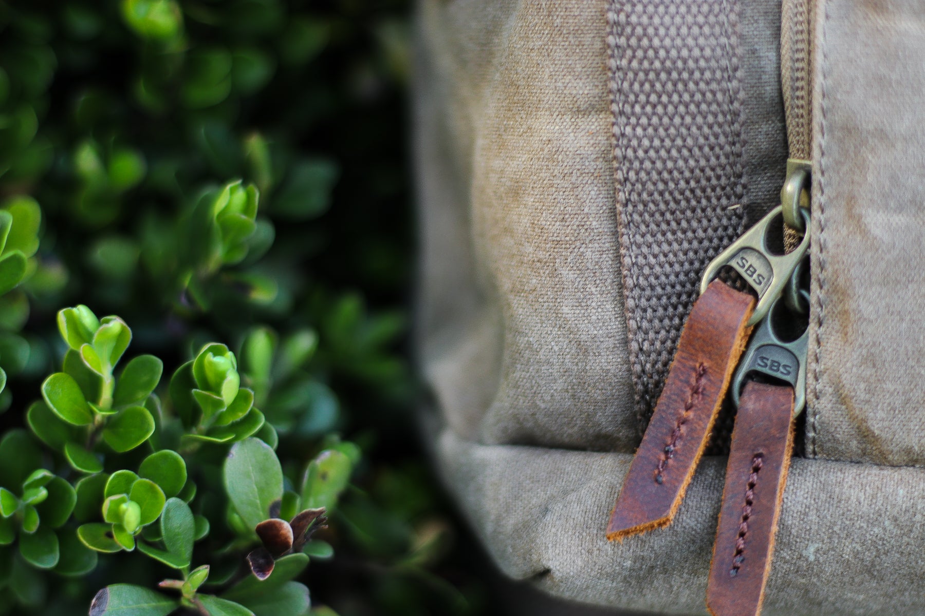 ripstop and watertight canvas and leather camera backpack with tripods holster